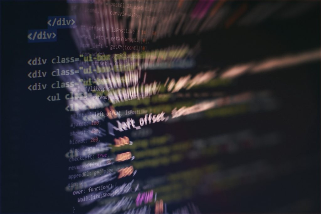 HTML markup on screen representing meta description and snippet code